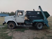 Вывоз мусора 8 кубовым контейнером