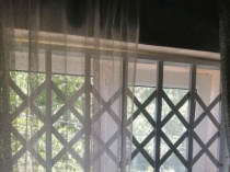 Розсувні решітки металеві на двері вікна балкони  вітрини  Виробництво і монтаж по всій Україні